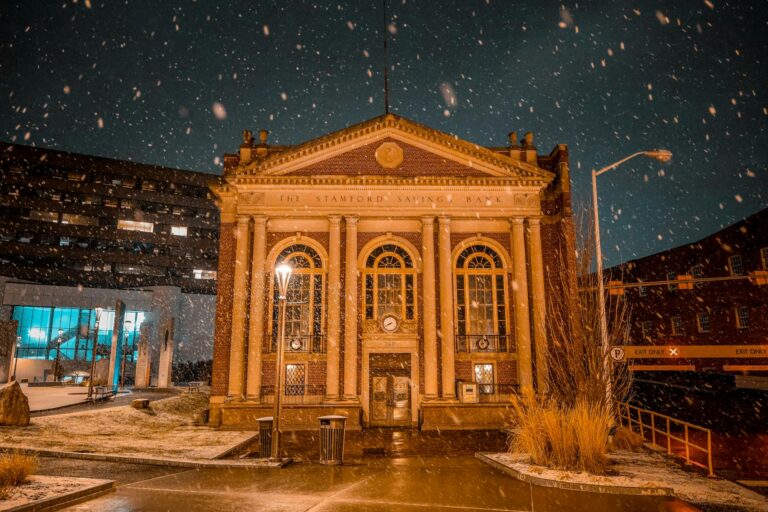 Modern regional bank branch building exterior with glass windows and corporate signage