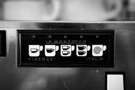 Modern automated coffee brewing equipment in commercial setting