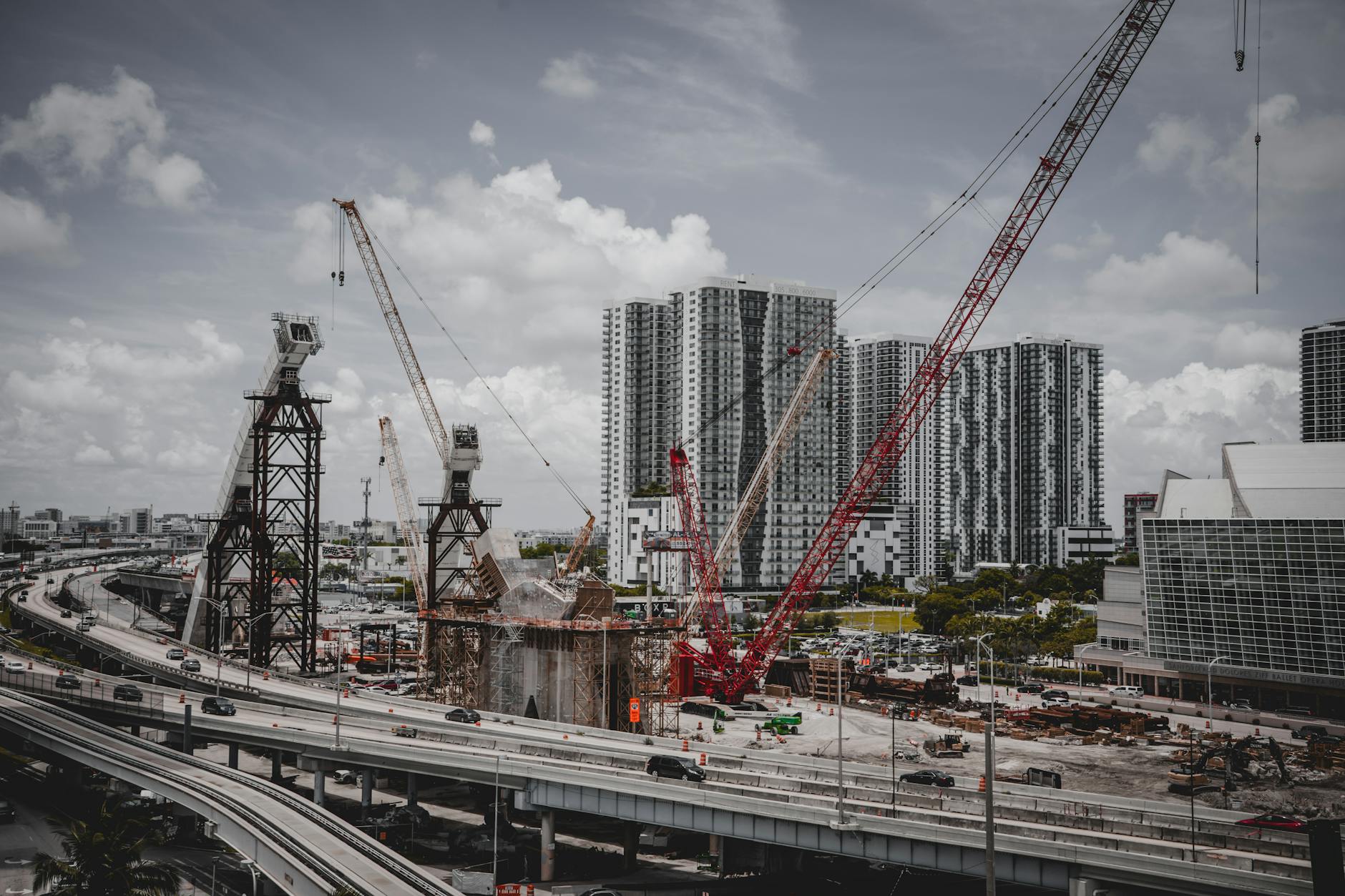 Construction workers repairing urban infrastructure with heavy machinery and road work equipment