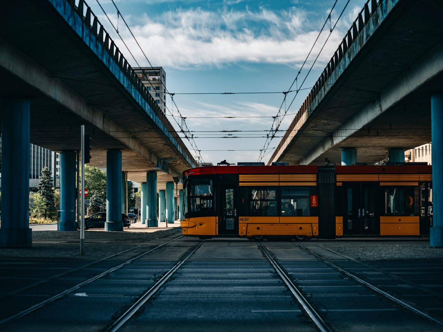 Urban infrastructure showing roads, bridges and utility systems requiring maintenance and investment