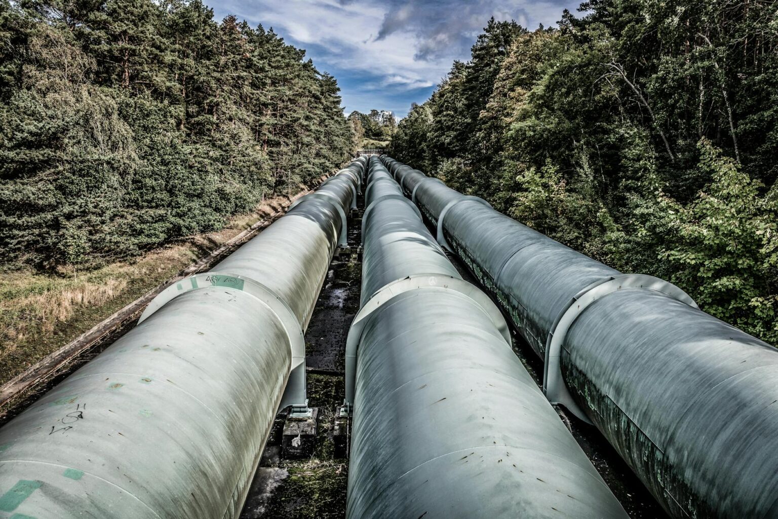 Large industrial natural gas pipeline infrastructure with monitoring equipment