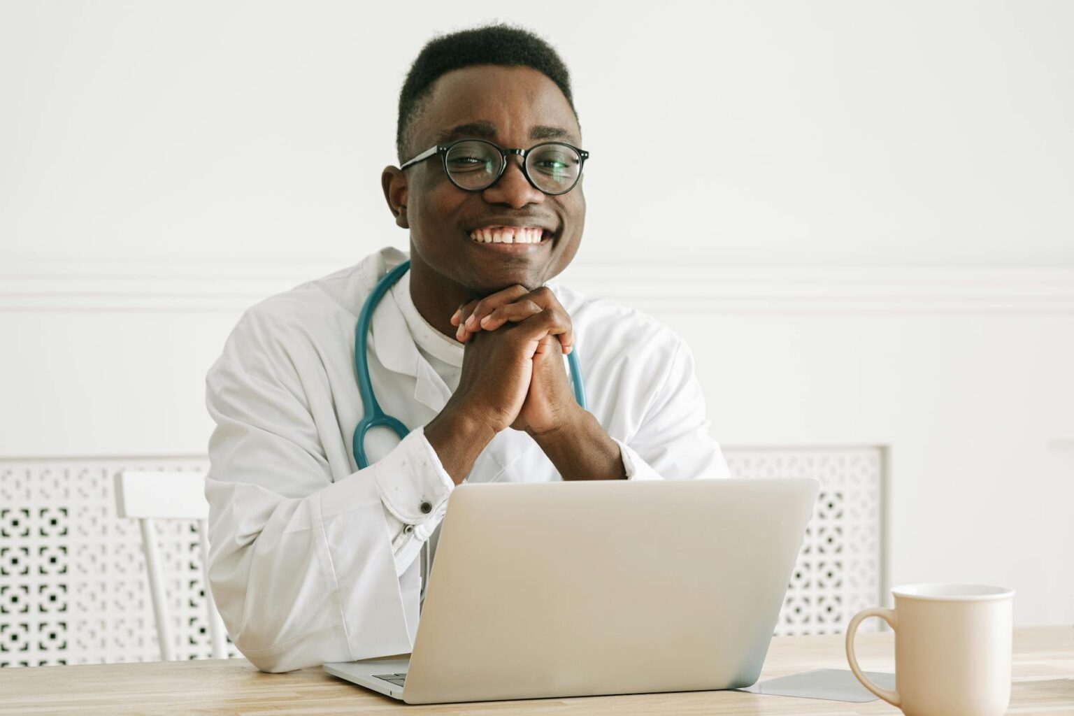 Telehealth Companies Consolidate as Insurance Coverage Policies Tighten Nationwide Healthcare professional using laptop computer for telehealth consultation