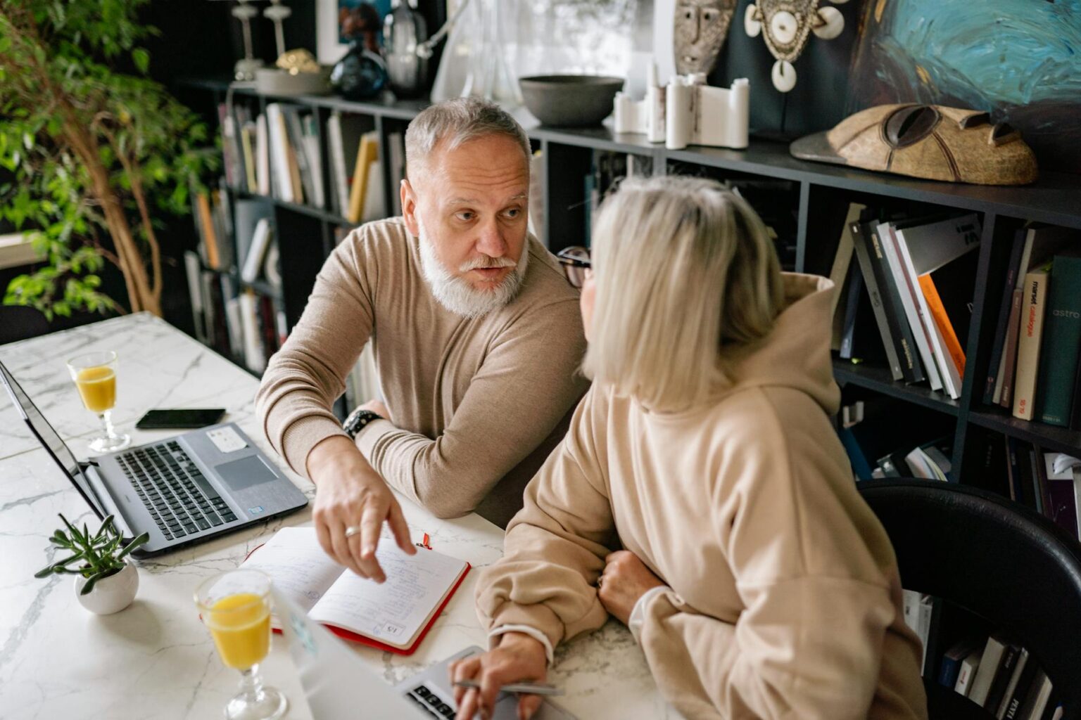 How Baby Boomers Are Shifting From Growth to Dividend Stocks Senior man reviewing investment portfolio on laptop computer