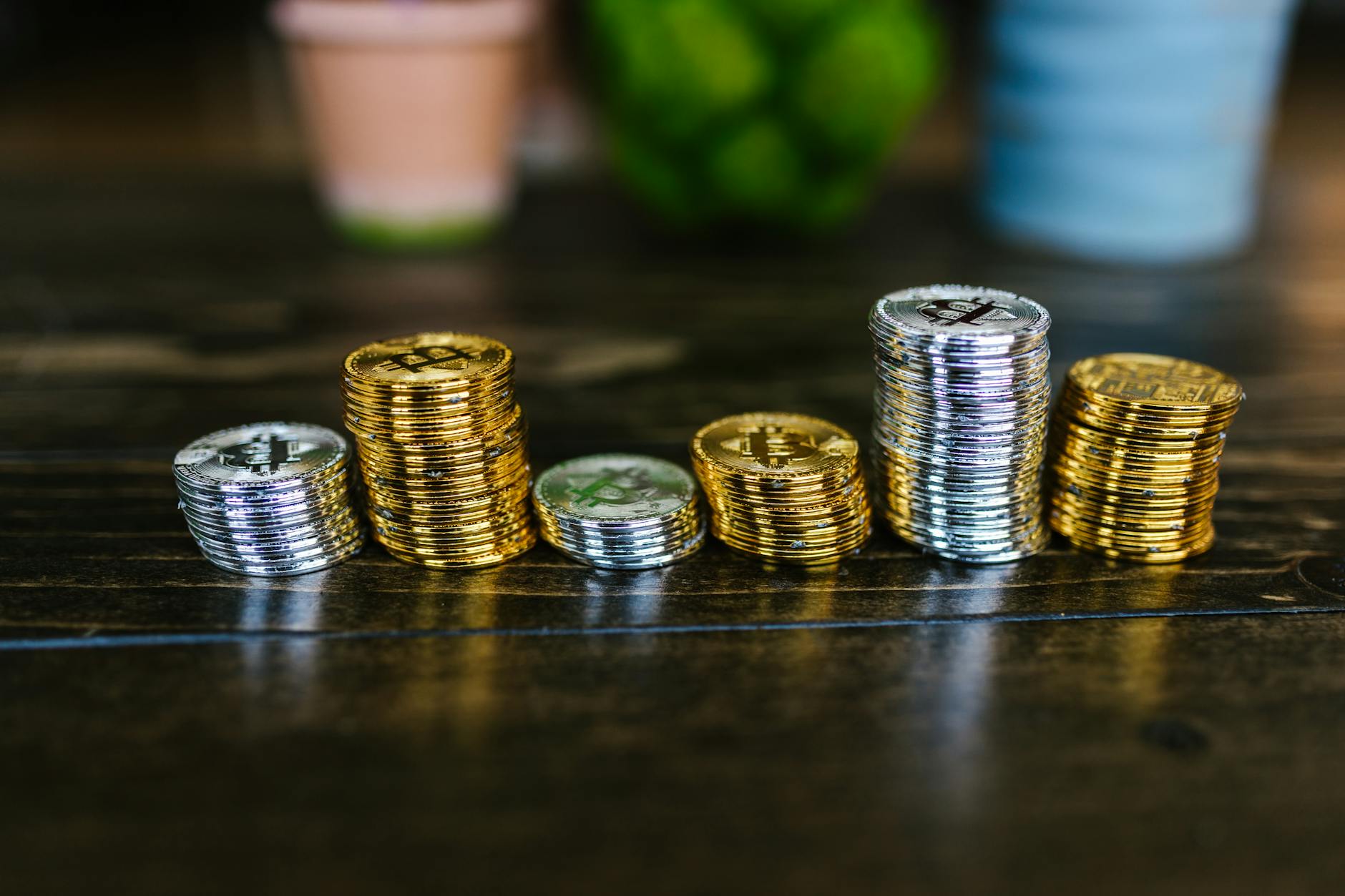 Stack of gold coins representing commodity investments and alternative assets