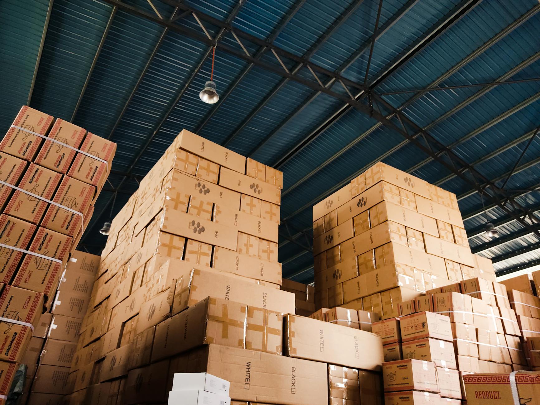 Warehouse facility filled with packages and shipping boxes ready for transport
