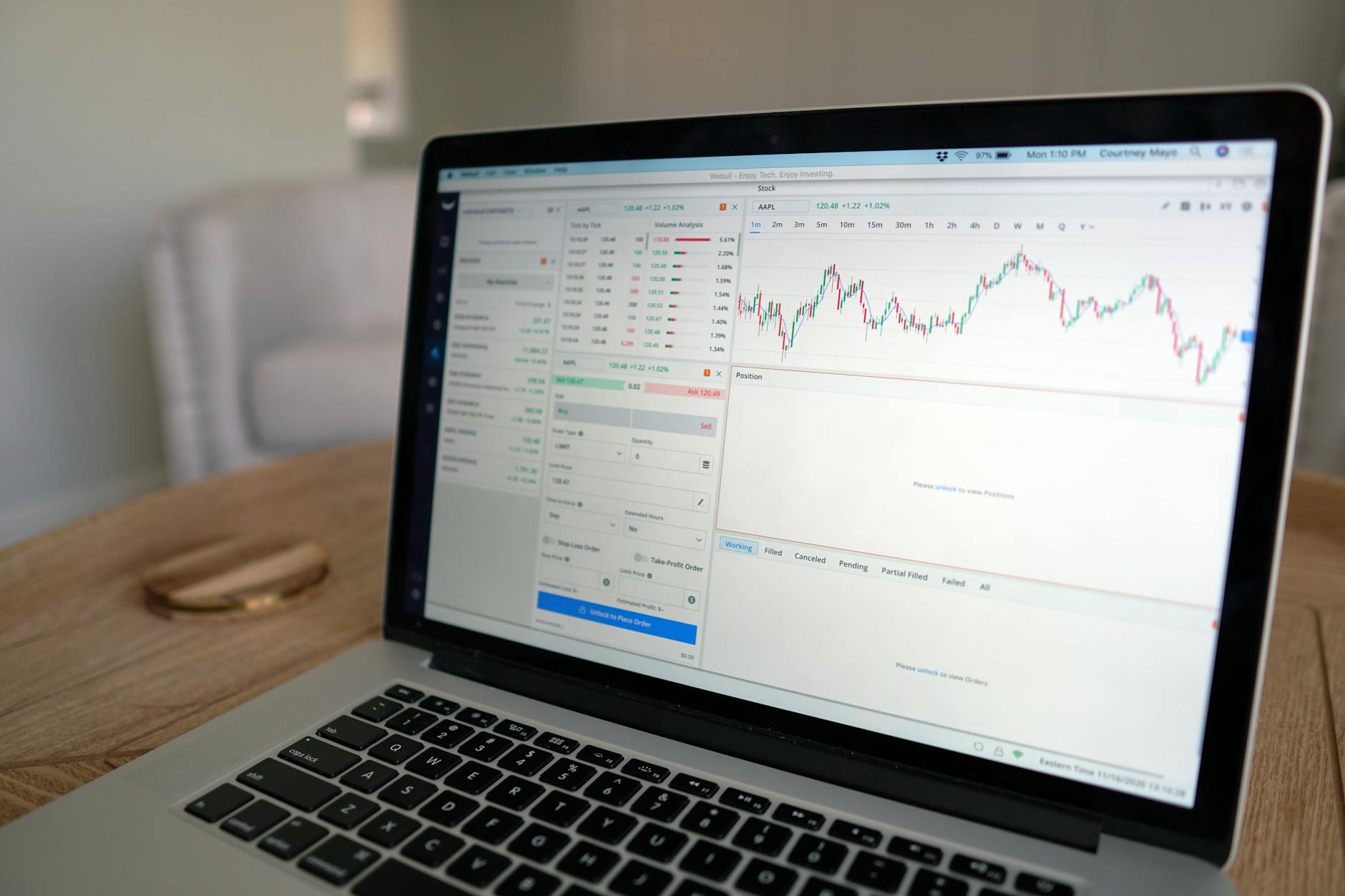 Modern trading desk with multiple monitors showing financial market data and currency exchange rates