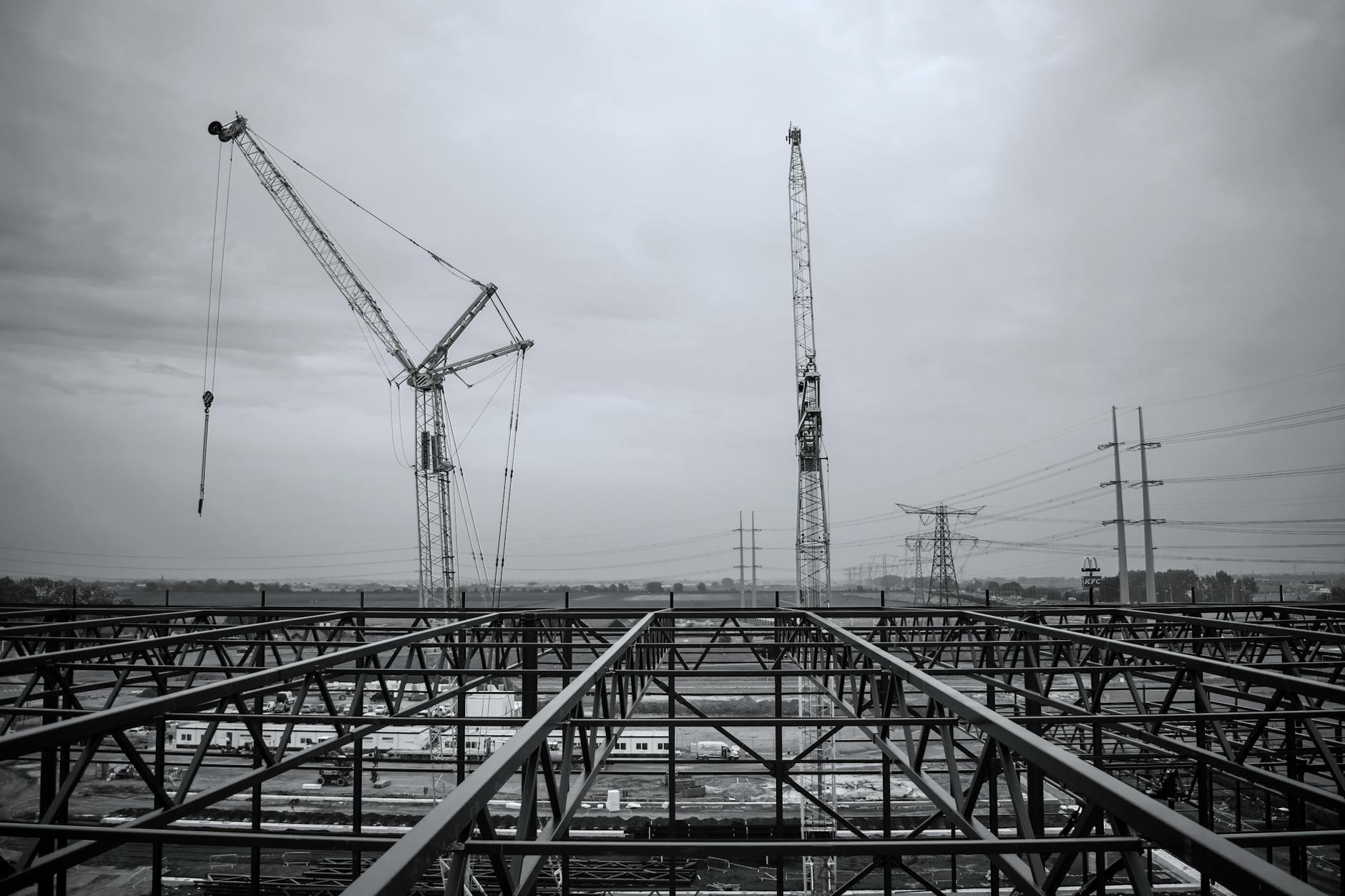 Infrastructure construction site with cranes and building development