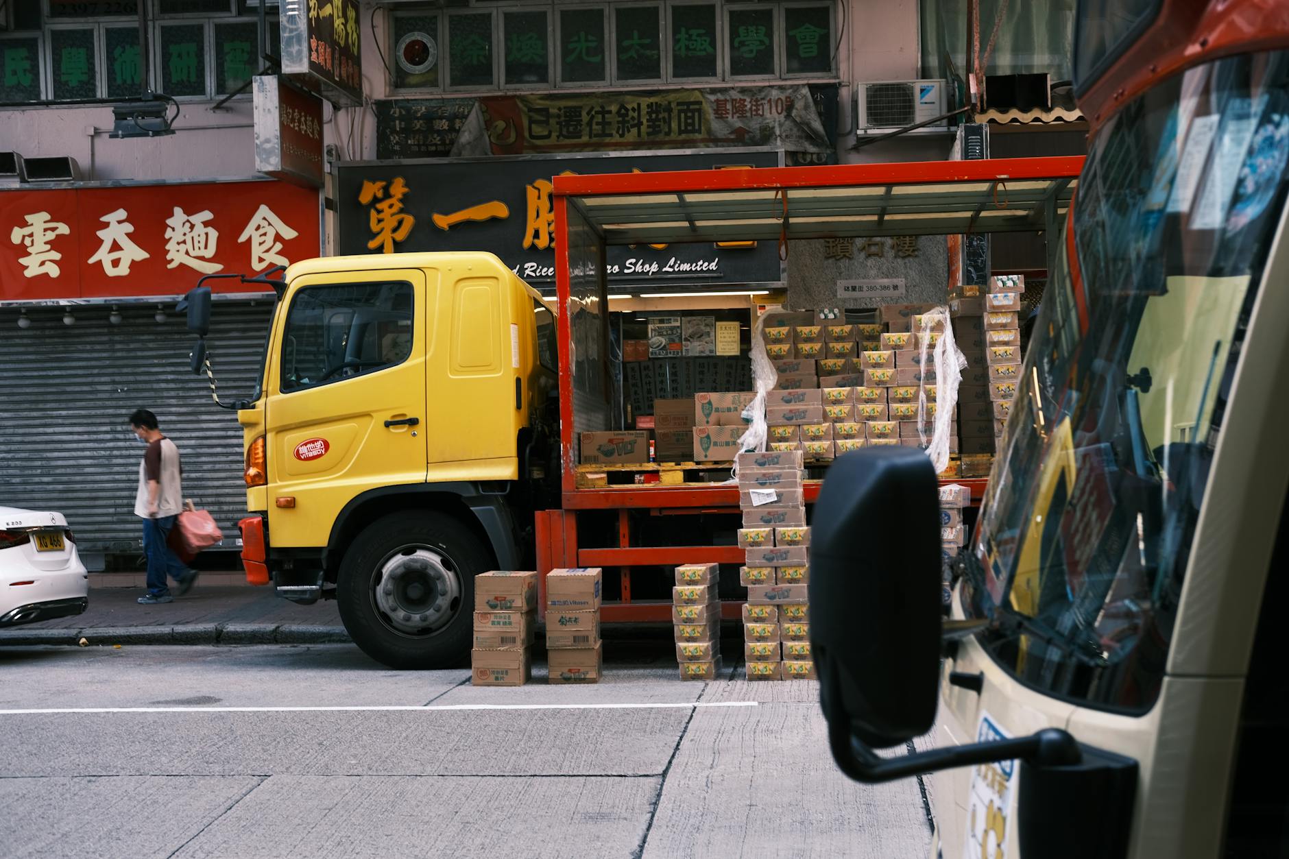 Delivery truck parked on residential street for grocery delivery