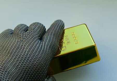 Stacked gold bars representing rising demand for gold as a store of value