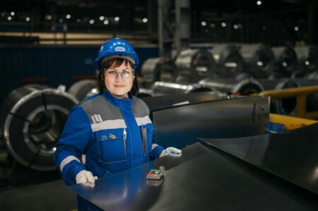 Worker in a domestic steel manufacturing facility on the production floor