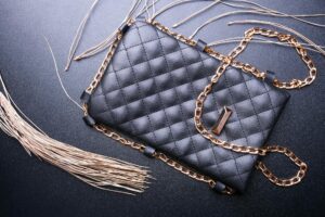 Display of luxury handbags in a high-end retail boutique