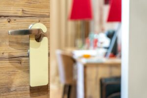 Major Hotel Chains Replace Mini-Bars With Amazon Delivery Lockers Modern hotel room with clean interior design and amenities