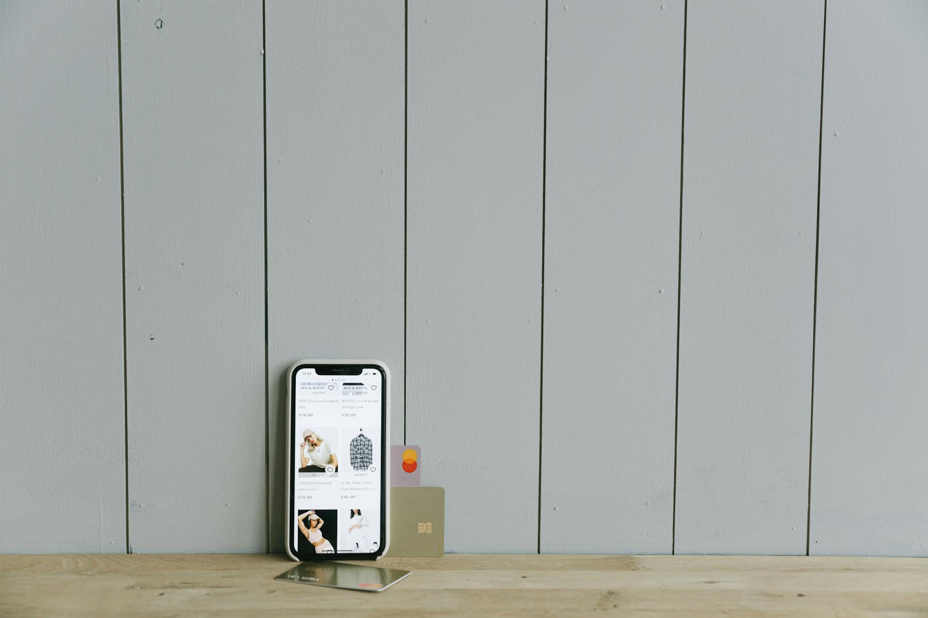 Person using mobile banking application on smartphone screen