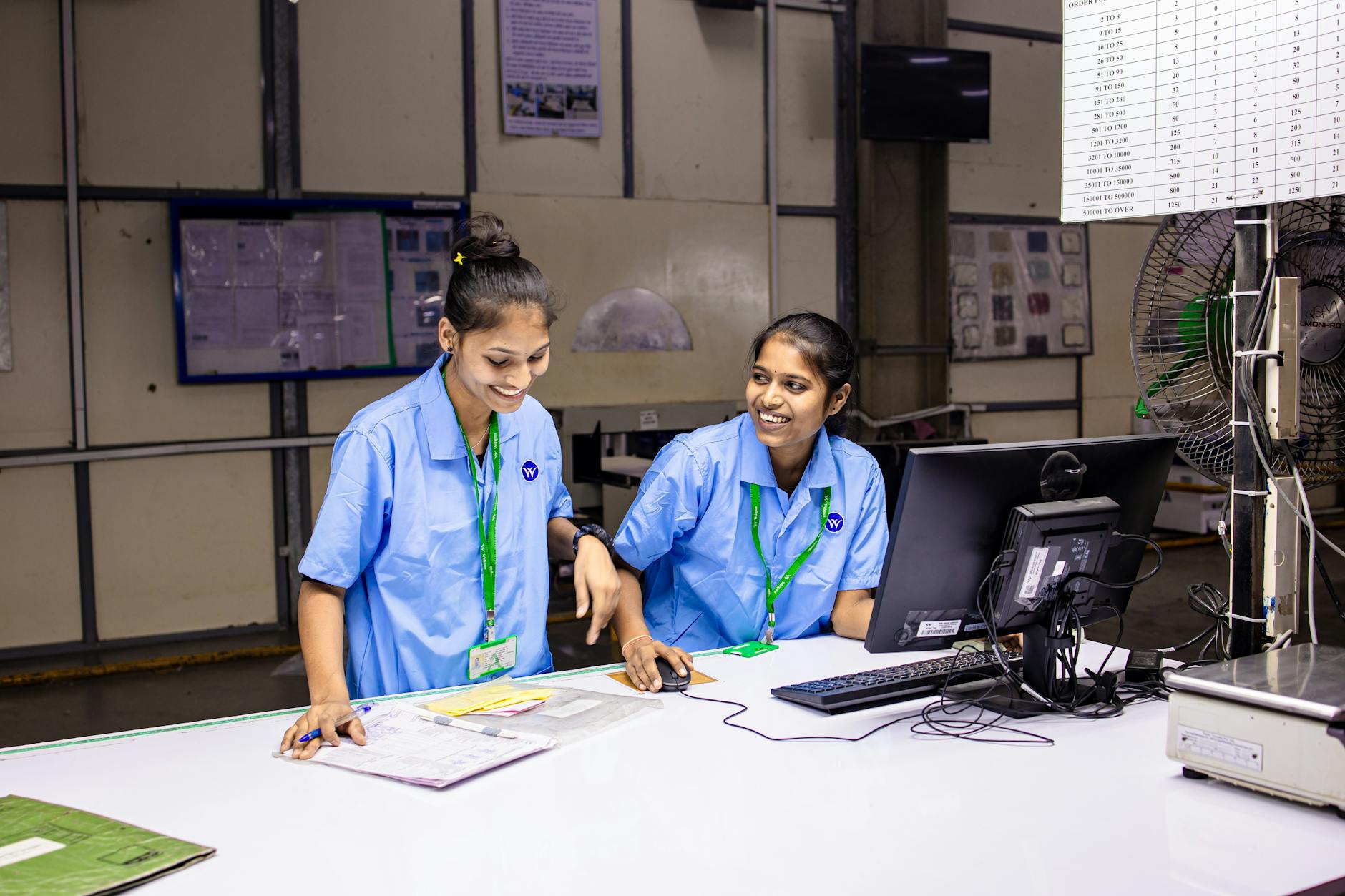 Corporate employees working collaboratively in modern office environment