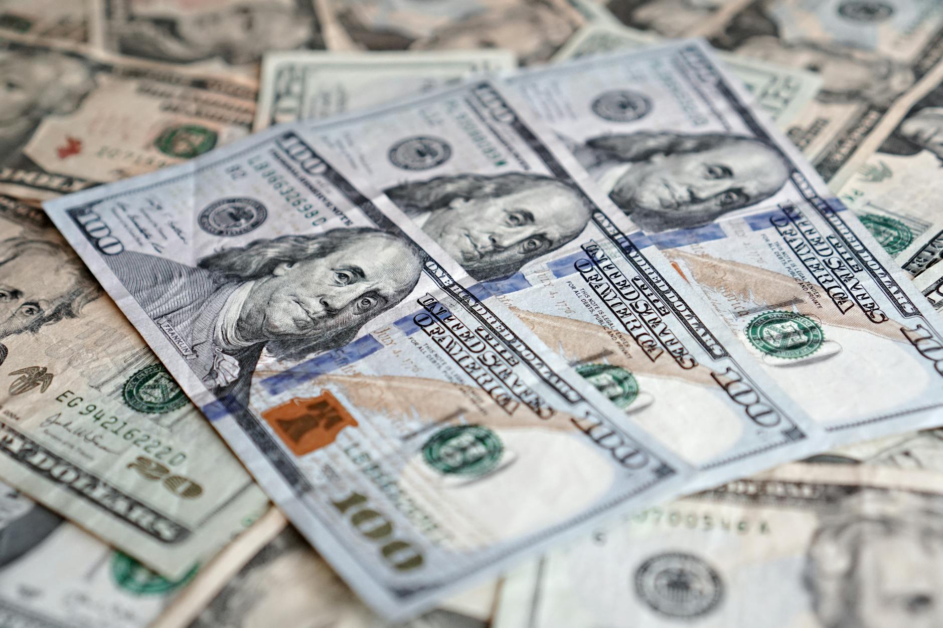 Stacks of cash next to financial documents representing a large cash reserve strategy