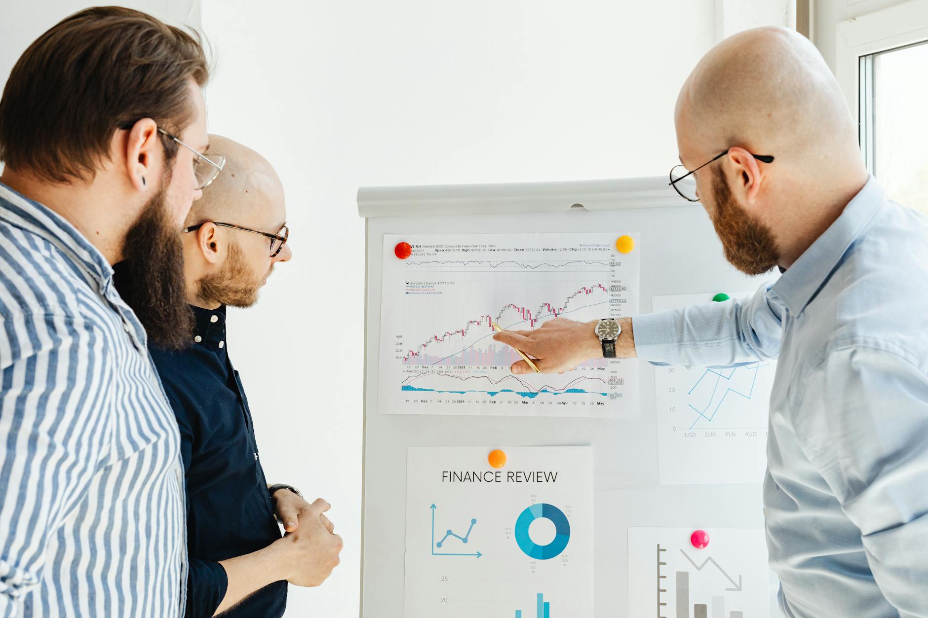 Investor reviewing fixed income portfolio documents at a desk