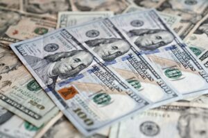Treasury Inflation-Protected Securities Quietly Attract Institutional Money Stack of government bond certificates representing Treasury securities investment