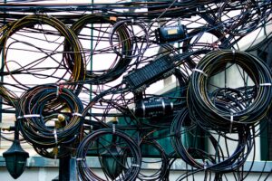 Rolls of copper wire in an industrial warehouse setting