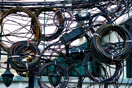 Rolls of copper wire in an industrial warehouse setting