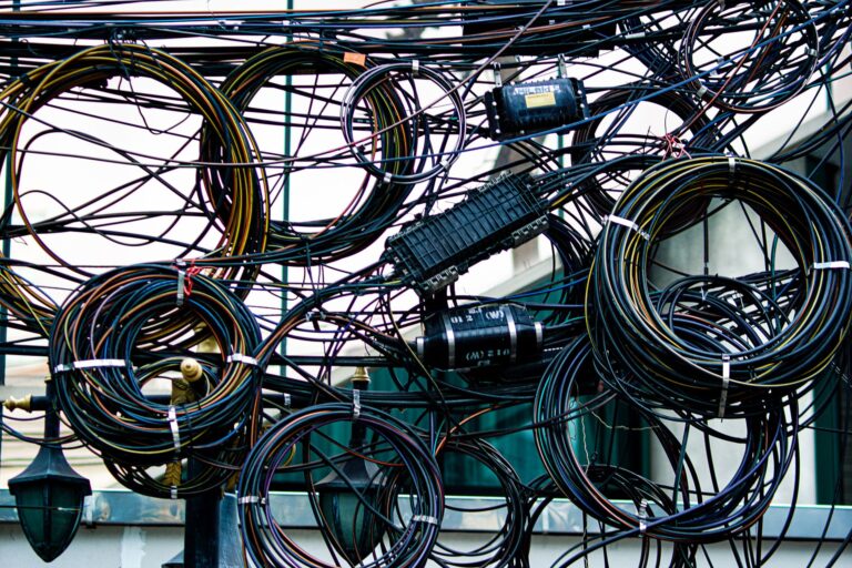 Rolls of copper wire in an industrial warehouse setting