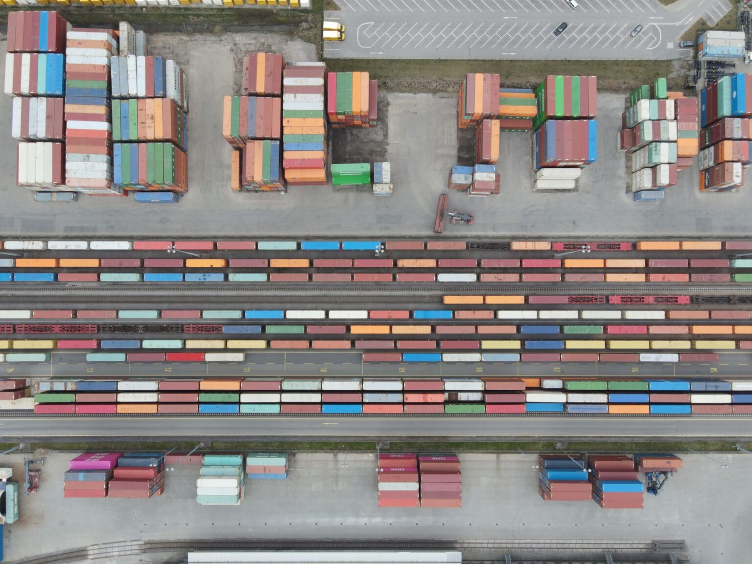 Freight containers stacked at an inland rail yard facility