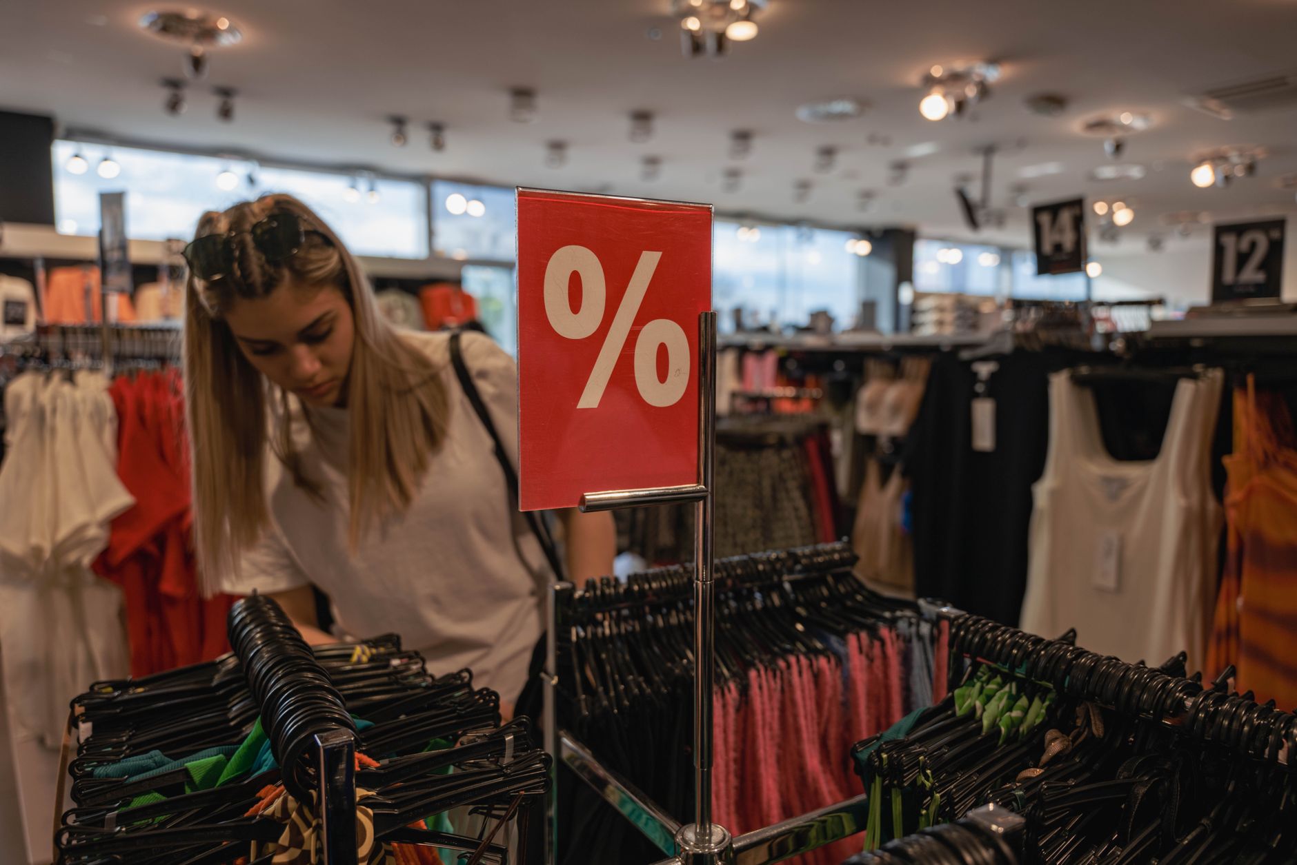Interior of a discount retail store with shelved consumer goods