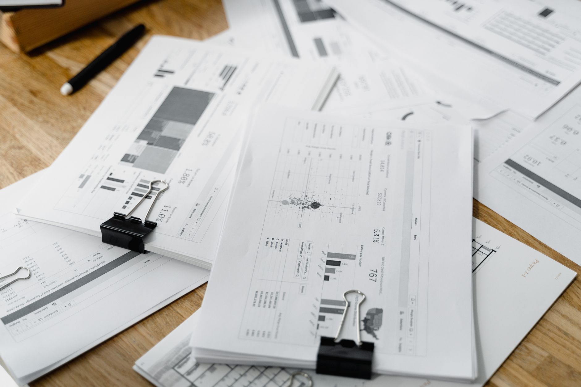 Business payroll tax documents and financial paperwork on a desk