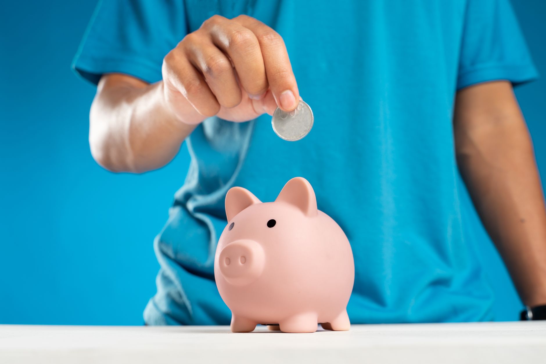 Retirement savings concept showing financial planning documents and a calculator
