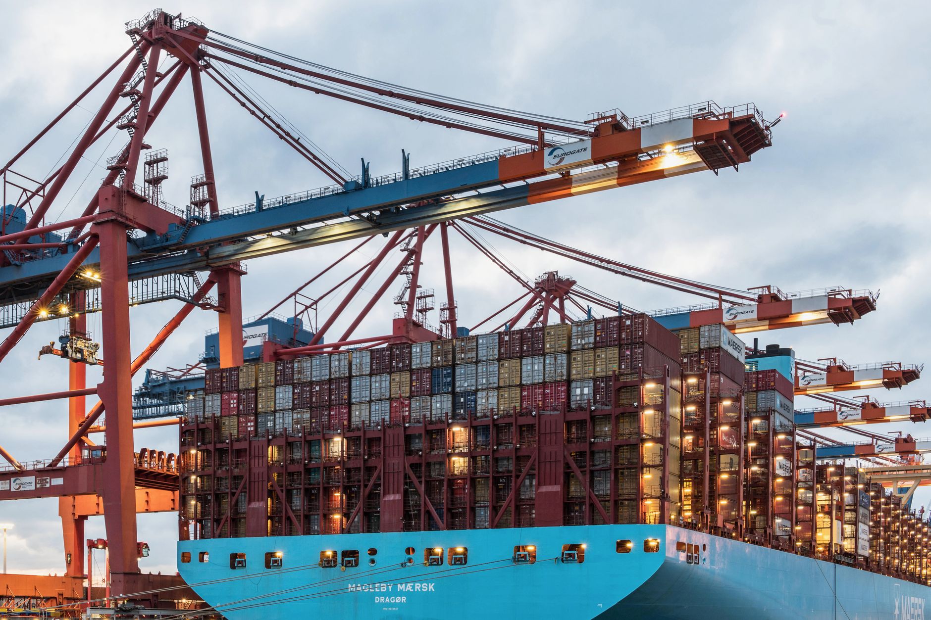 Rows of intermodal shipping containers stacked at a transportation hub