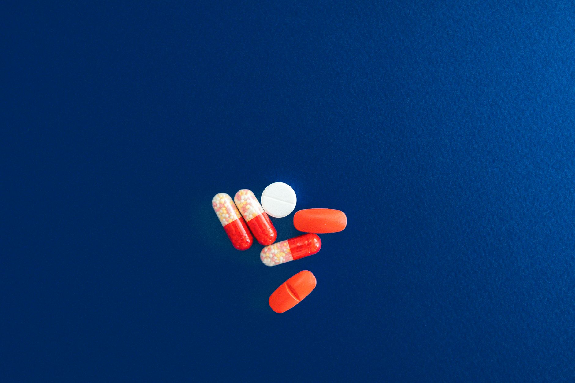 Close-up of prescription medication pills representing drug pricing debate