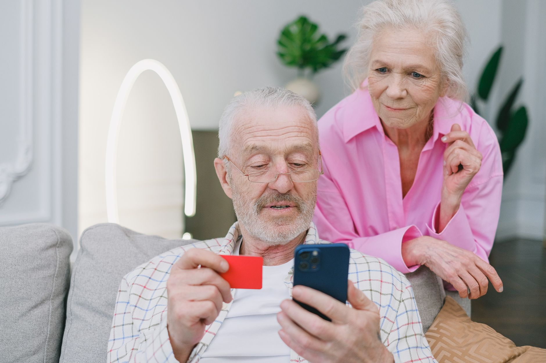 Senior couple reviewing financial documents representing retirement income planning