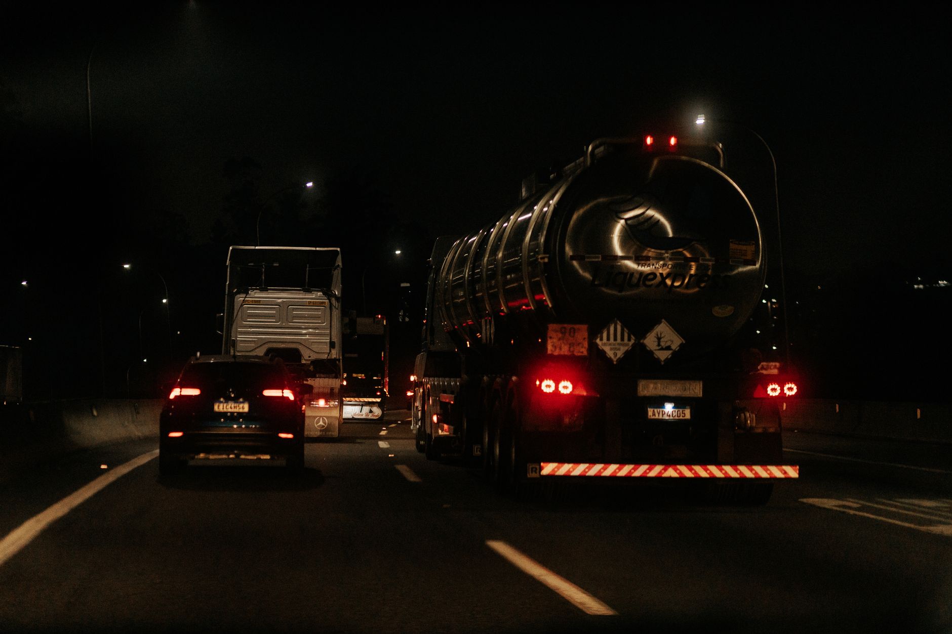 Commercial semi-truck driving on a highway representing the U.S. freight transportation industry