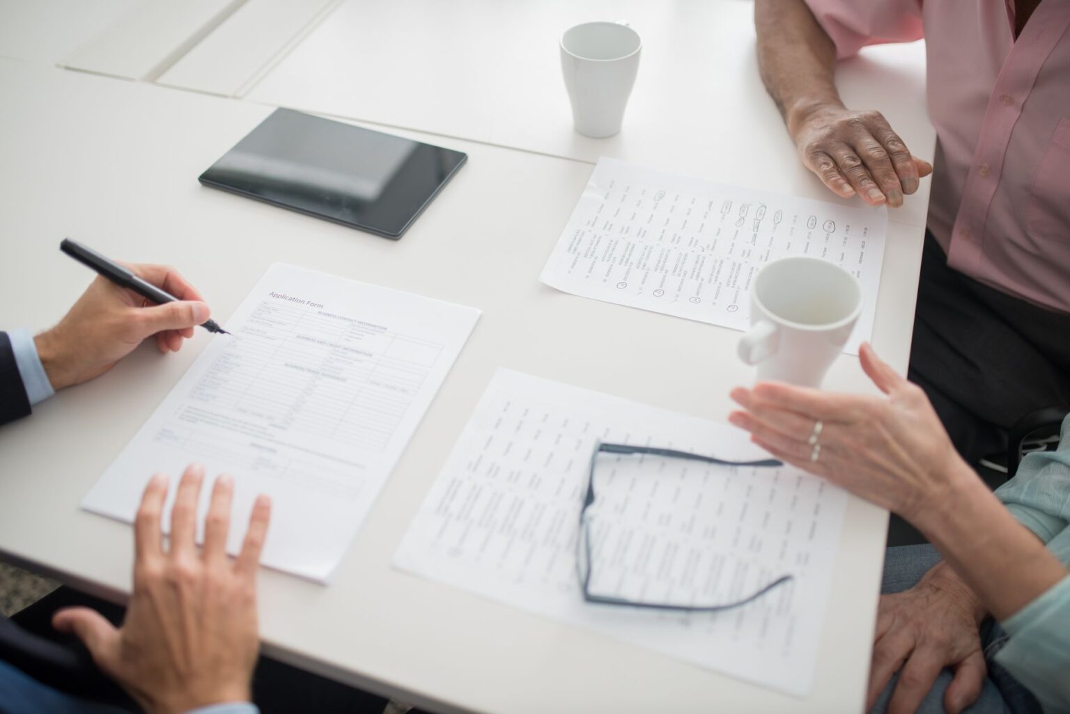 Medicare Advantage Overbilling Draws Renewed Federal Auditor Pressure Medicare insurance documents and paperwork on a desk representing billing audits