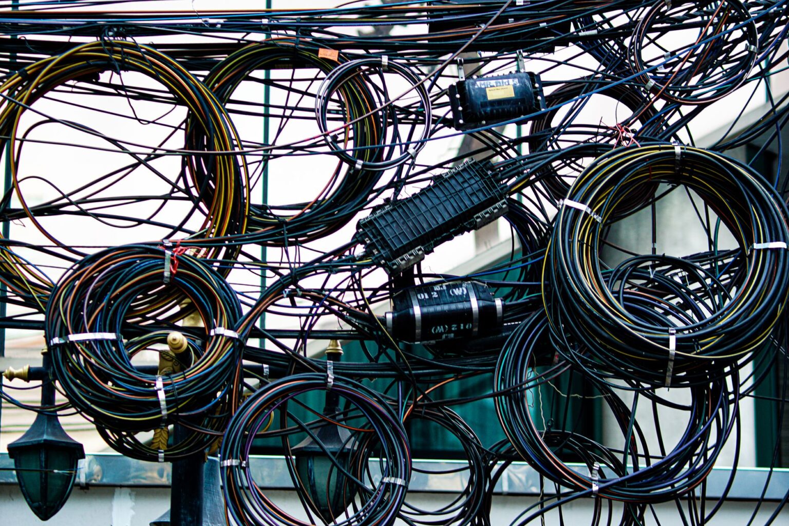 Coiled copper wire in an industrial setting representing raw material demand