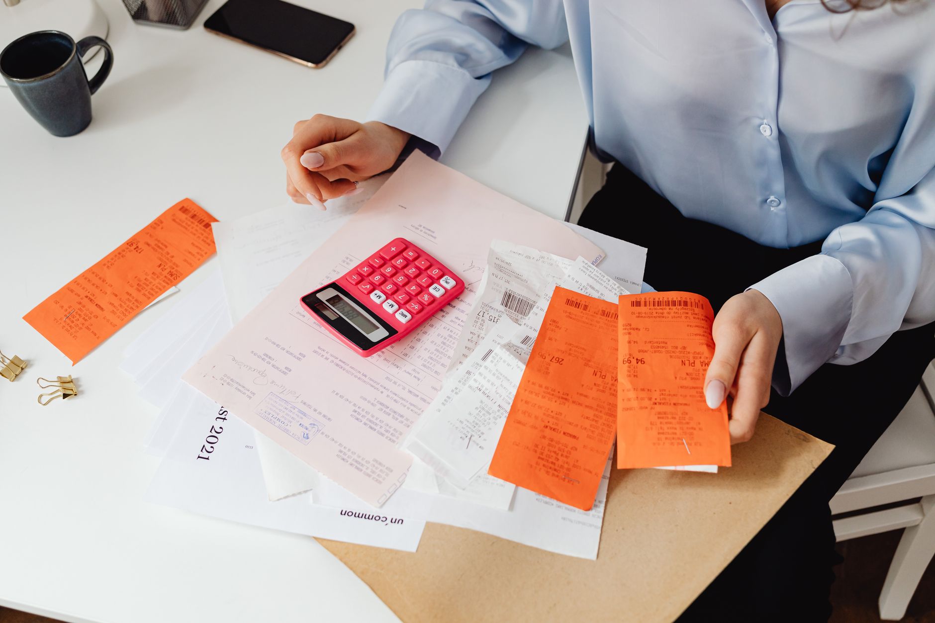 Healthcare billing documents and insurance forms on a desk
