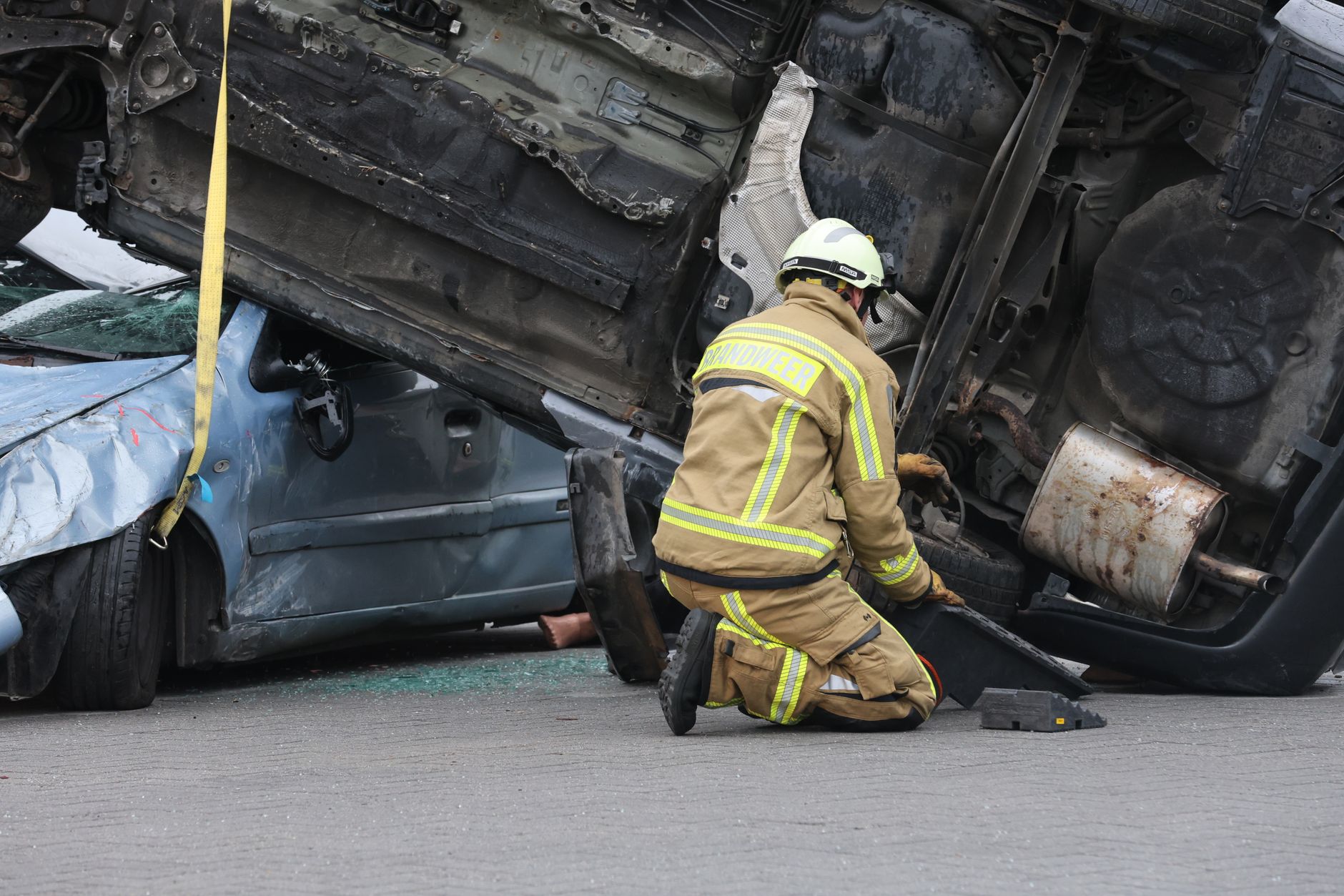 Damaged commercial truck on roadside illustrating crash liability costs in trucking insurance