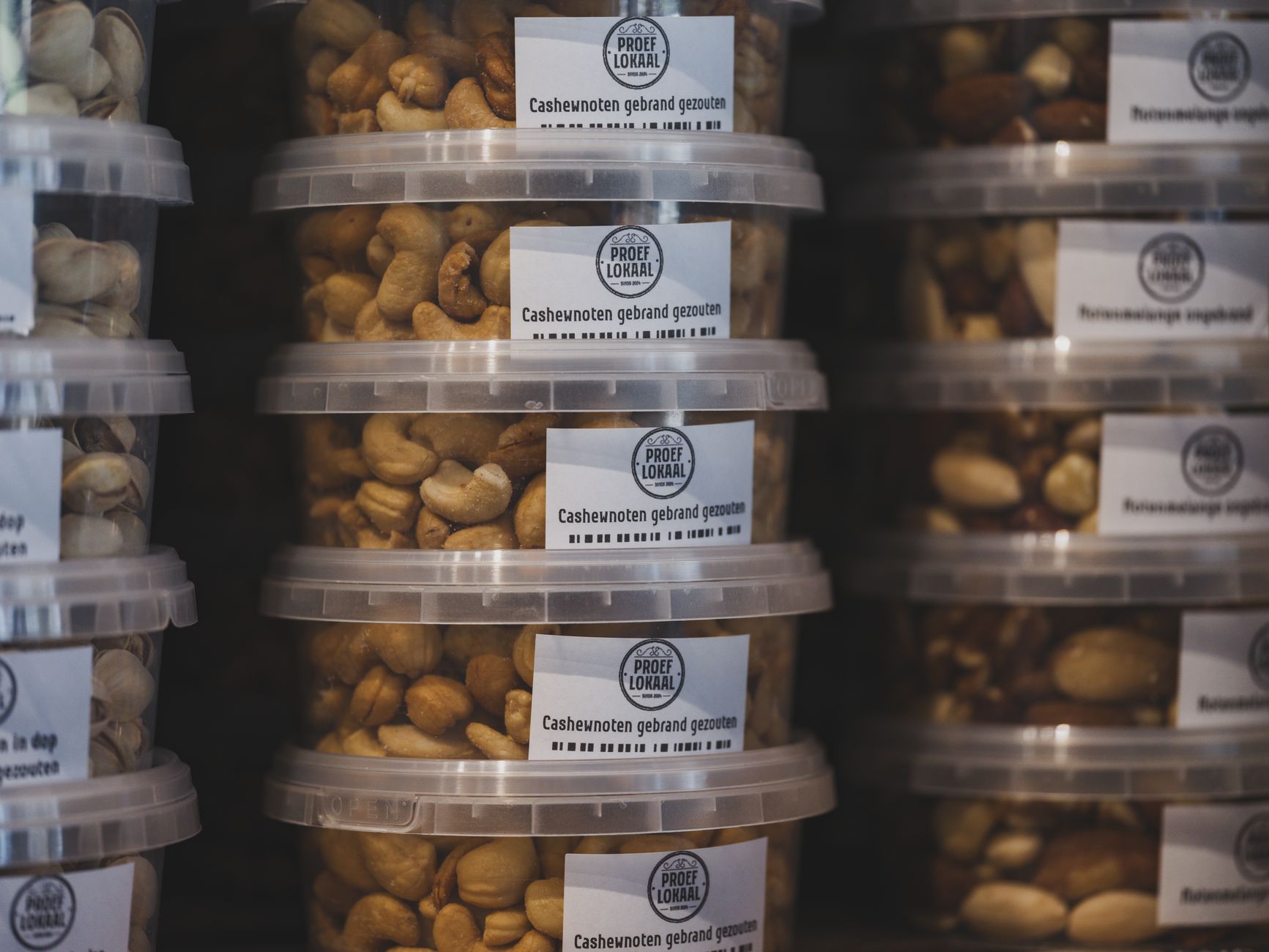 Close-up of consumer product packaging labels showing nutrition and weight information