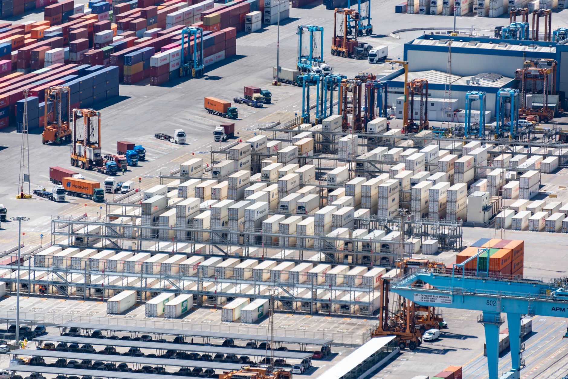Rows of stacked shipping containers in an automated port terminal yard