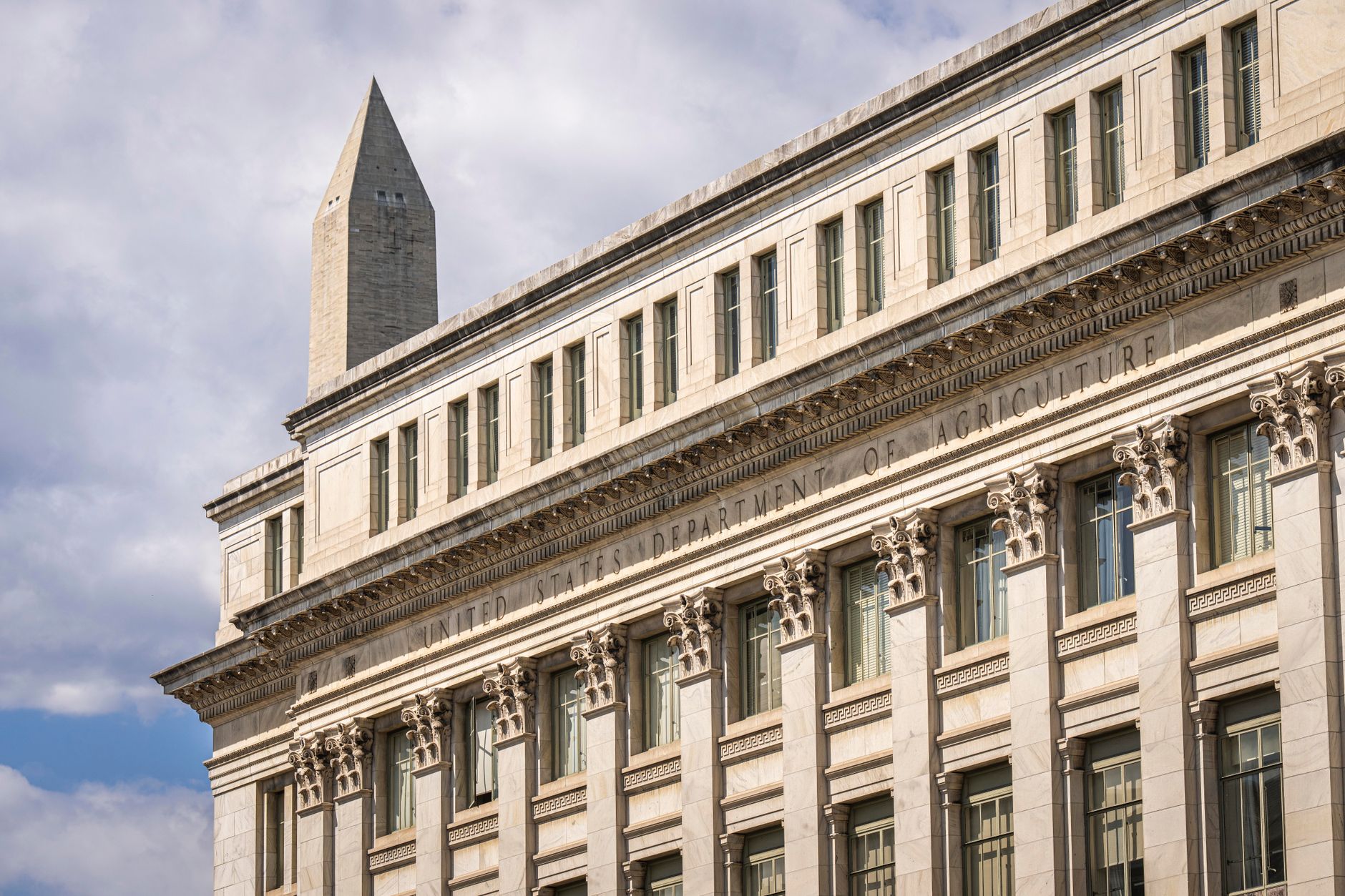 Federal government building exterior representing regulatory enforcement activity