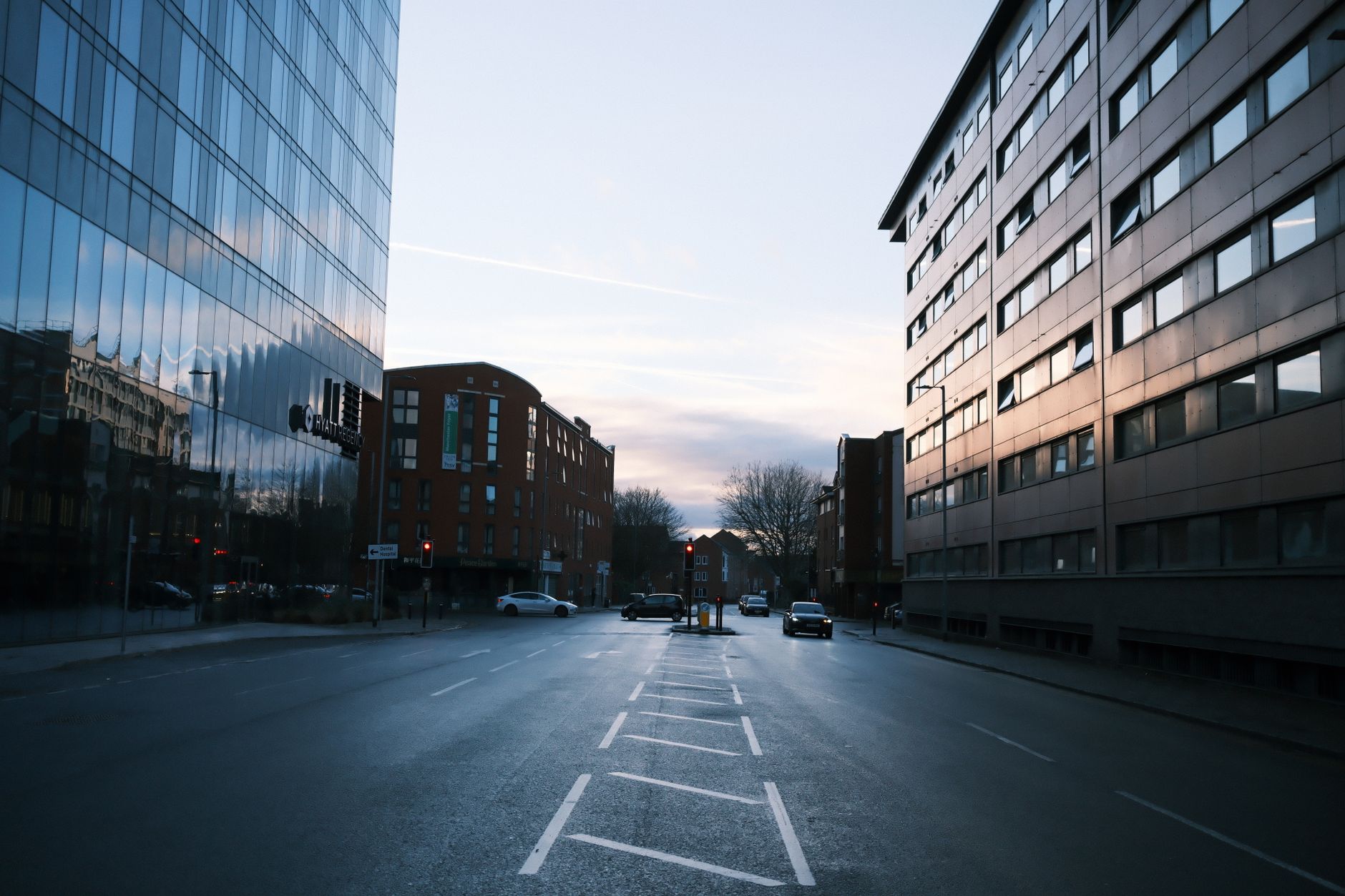 Empty urban commercial street reflecting softened consumer activity and local tax revenue concerns