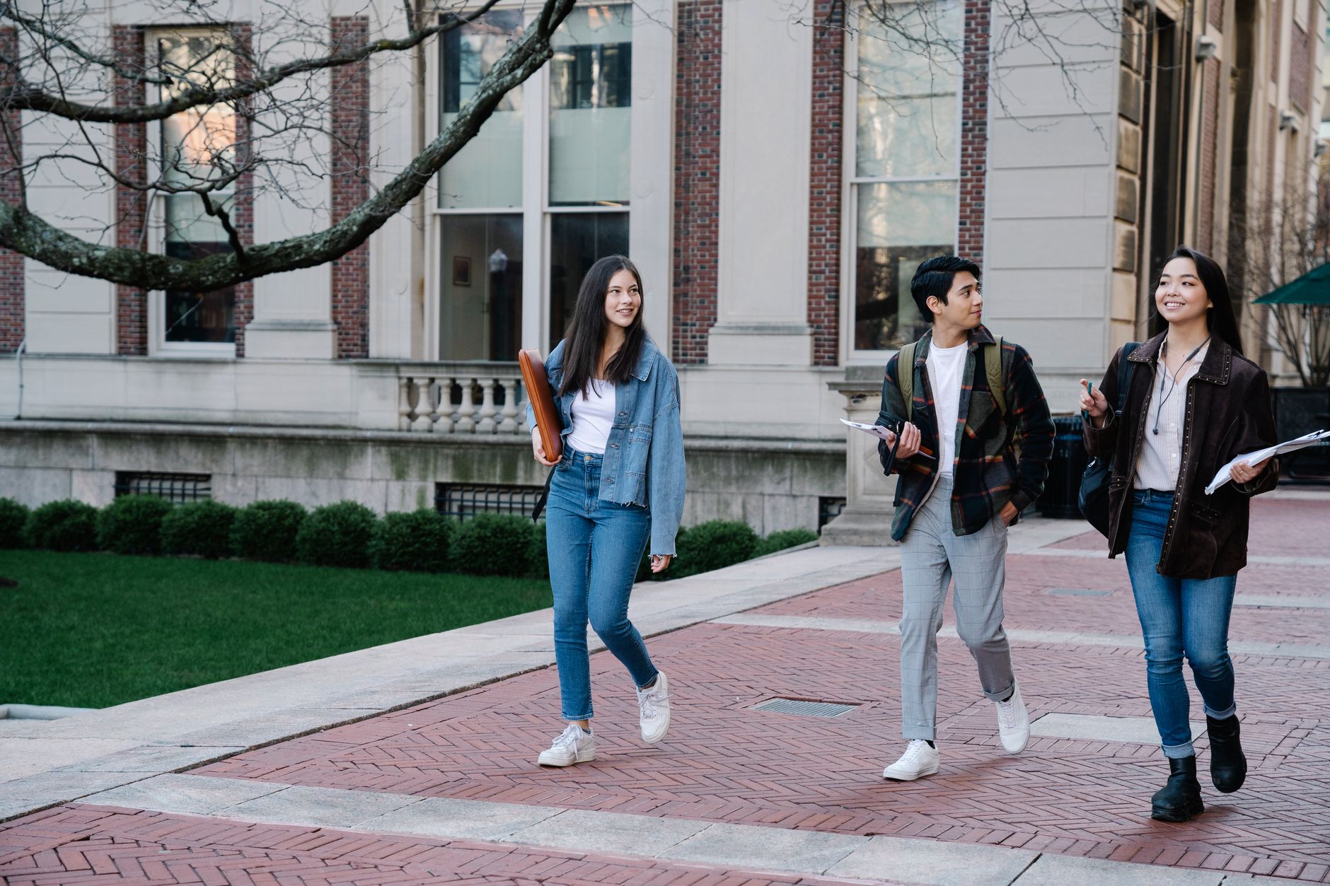 College students walking across campus before the fall semester begins
