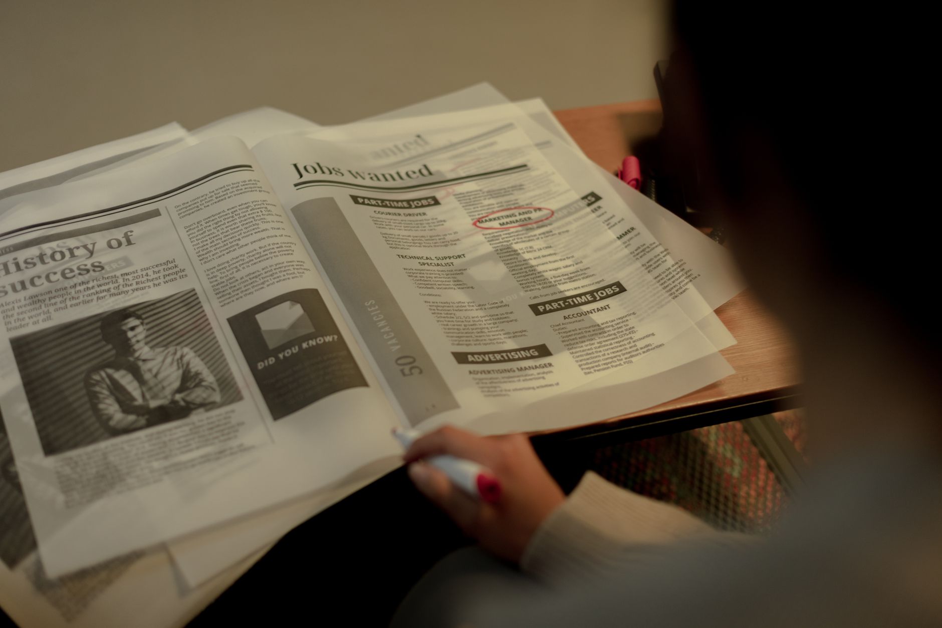 Person waiting in line at an unemployment benefits office