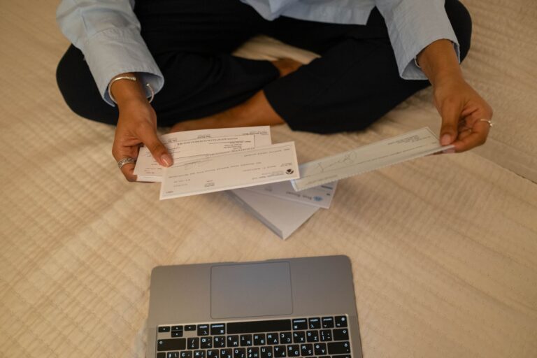 Medical billing documents on a desk representing healthcare cost distribution