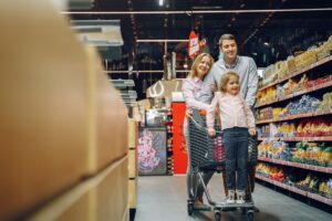 Grocery Shrinkflation Complaints Pile Up as Consumer Patience Thins A shopper browsing products on a grocery store shelf