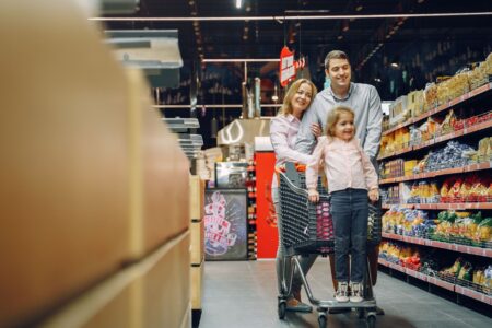 Grocery Shrinkflation Complaints Pile Up as Consumer Patience Thins A shopper browsing products on a grocery store shelf