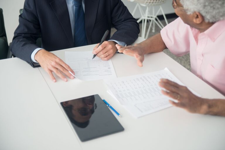 Medicare Advantage Overpayments Face Fresh Federal Clawback Push Medicare insurance paperwork and documents spread on a desk