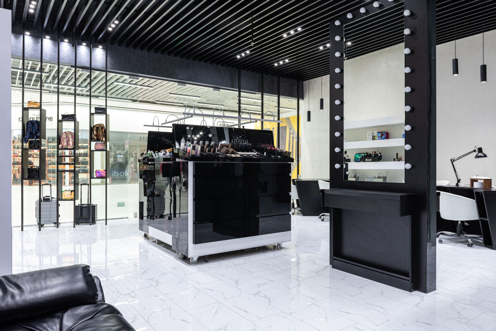 Rows of sofas and furniture displayed inside a rent-to-own retail store