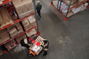 Workers on a domestic manufacturing factory floor during production shift