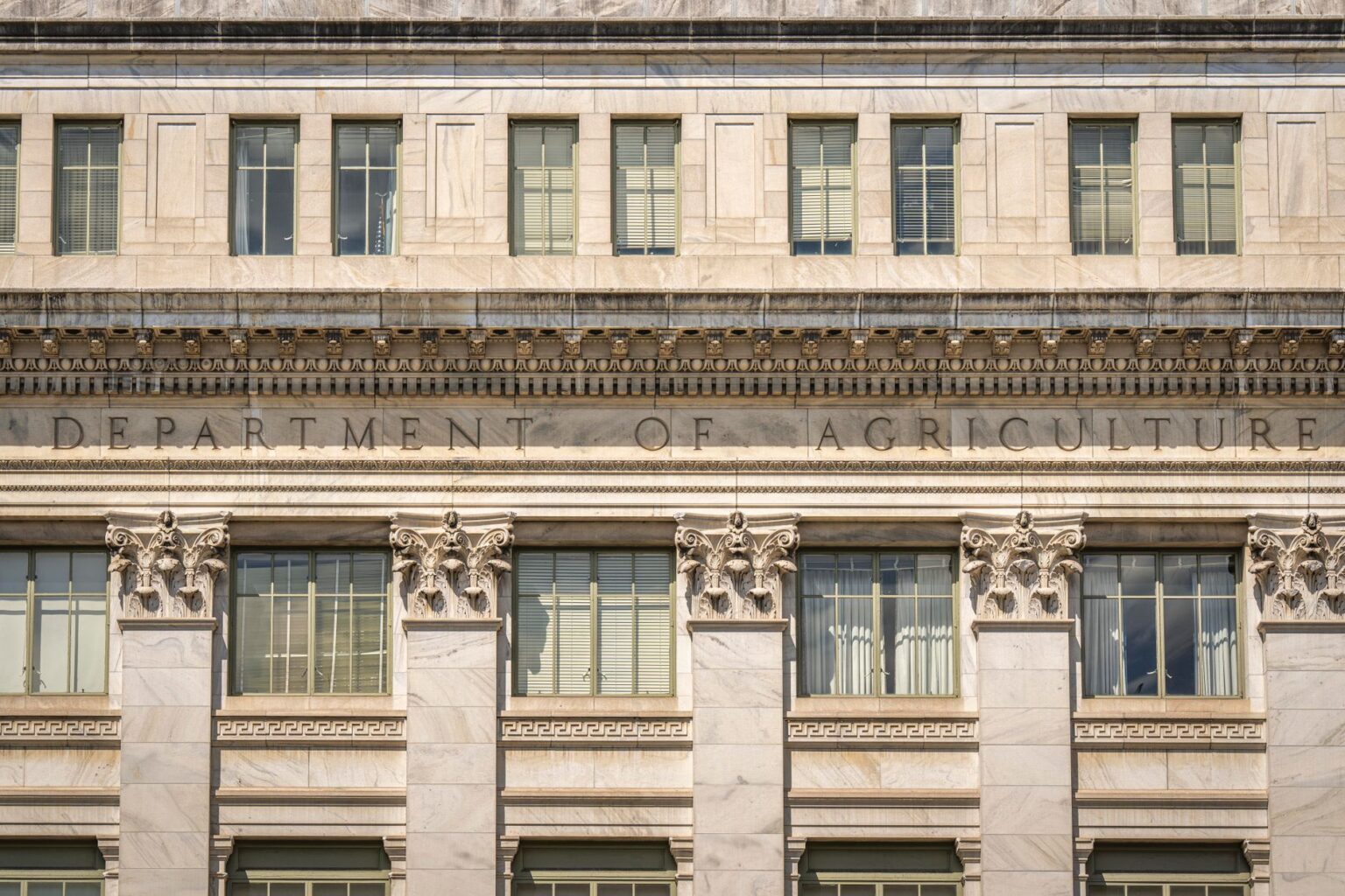 Defense Contractor Hiring Surge Strains Cleared Workforce Pipeline Federal government office building exterior representing defense contracting agencies