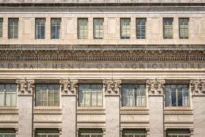 Defense Contractor Hiring Surge Strains Cleared Workforce Pipeline Federal government office building exterior representing defense contracting agencies